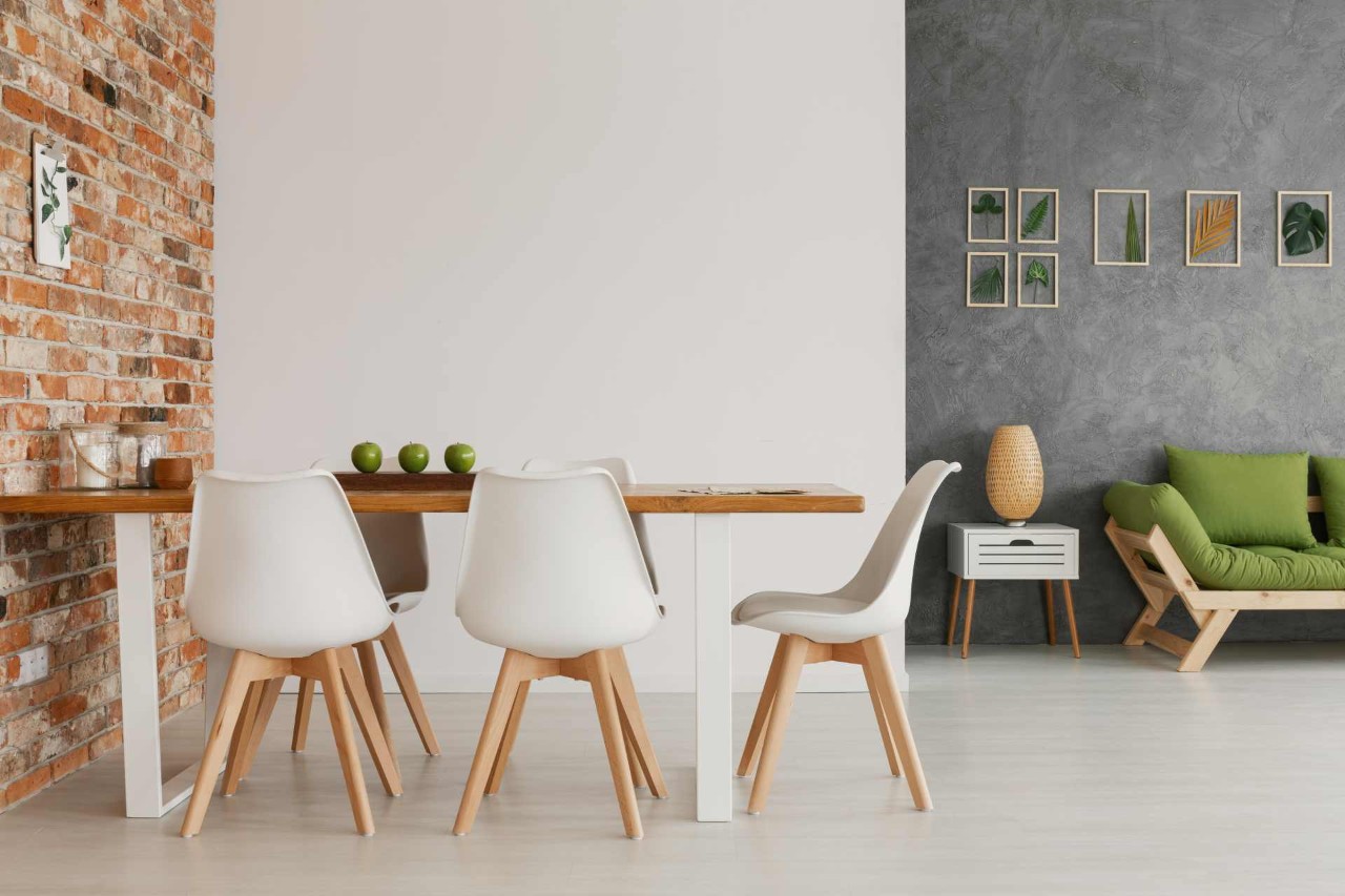 A modern room has a white carpet and grey and tan walls with a fan near Concord, California (CA)