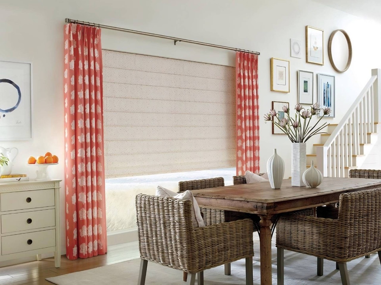 Brightly lit bedroom with Hunter Douglas Alustra® Woven Textures Roman Shades hanging in the windows near Concord, CA