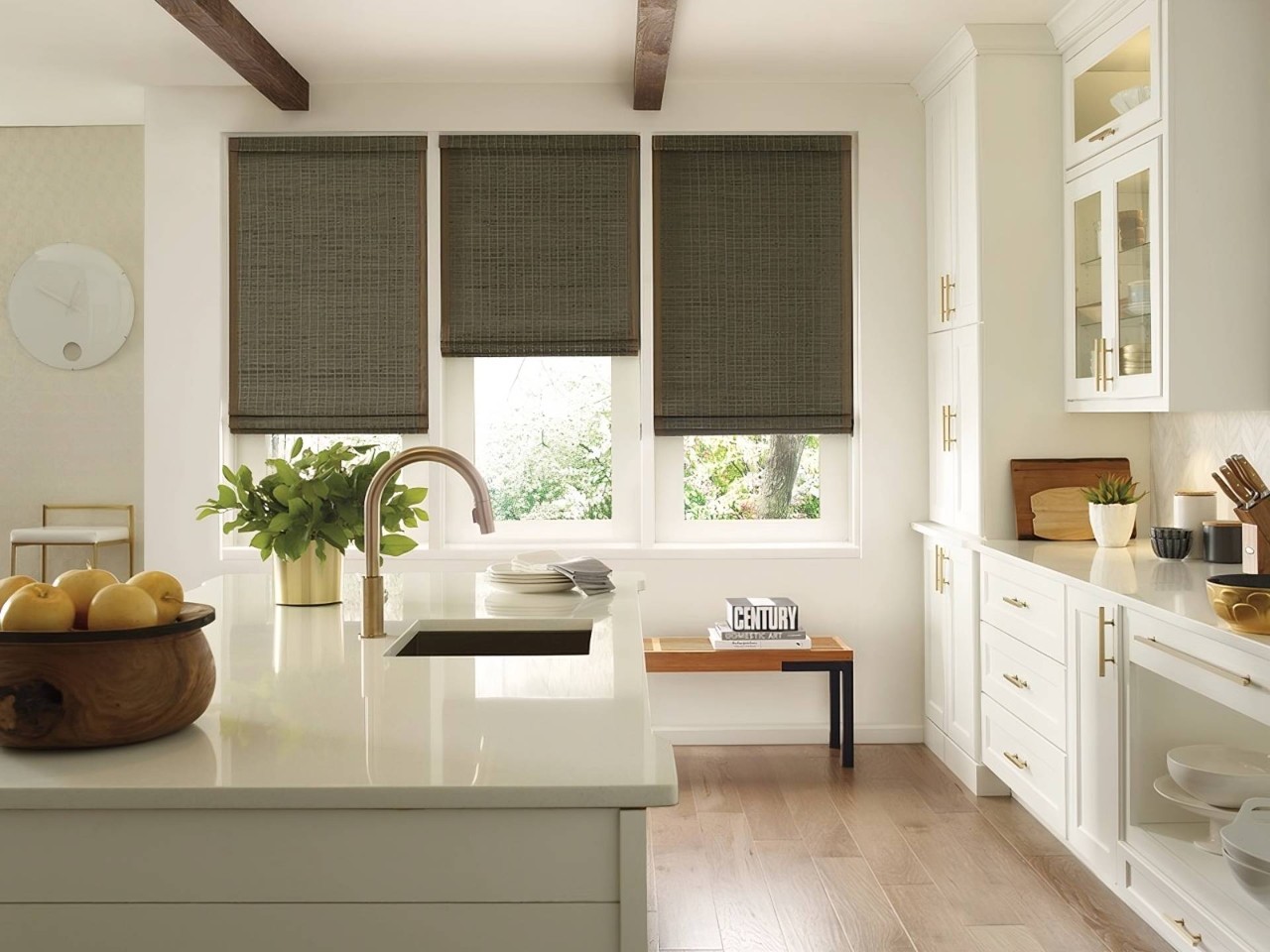 Hunter Douglas Provenance® Woven Wood Shades decorating three windows in a home kitchen near Concord, CA